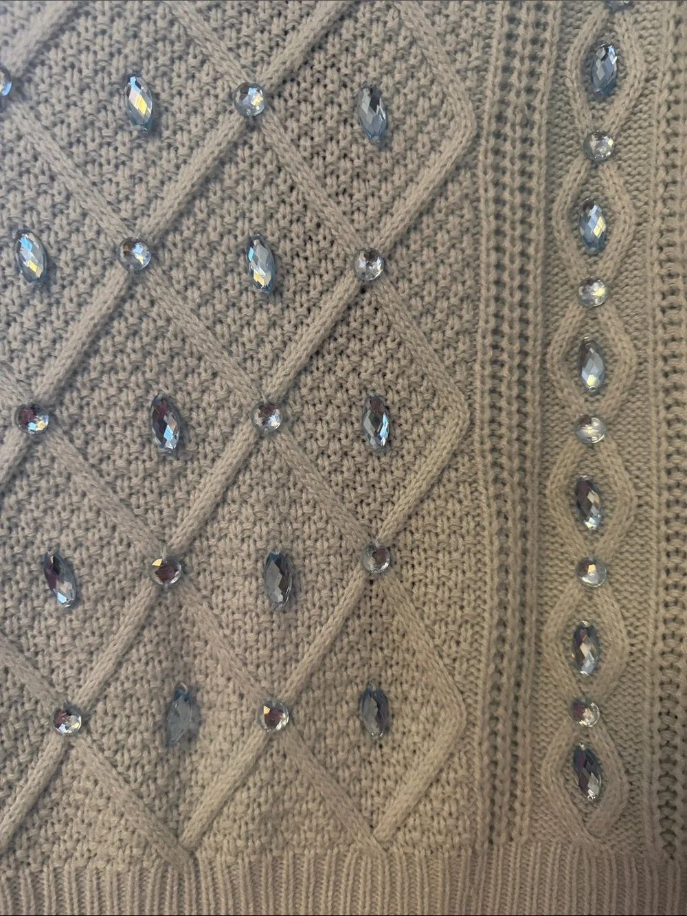 Elegant Light Blue Knit Sweater with Embellishments